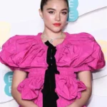 Florence Pugh wear a sheer pink Valentino gown during the brand’s show in Rome