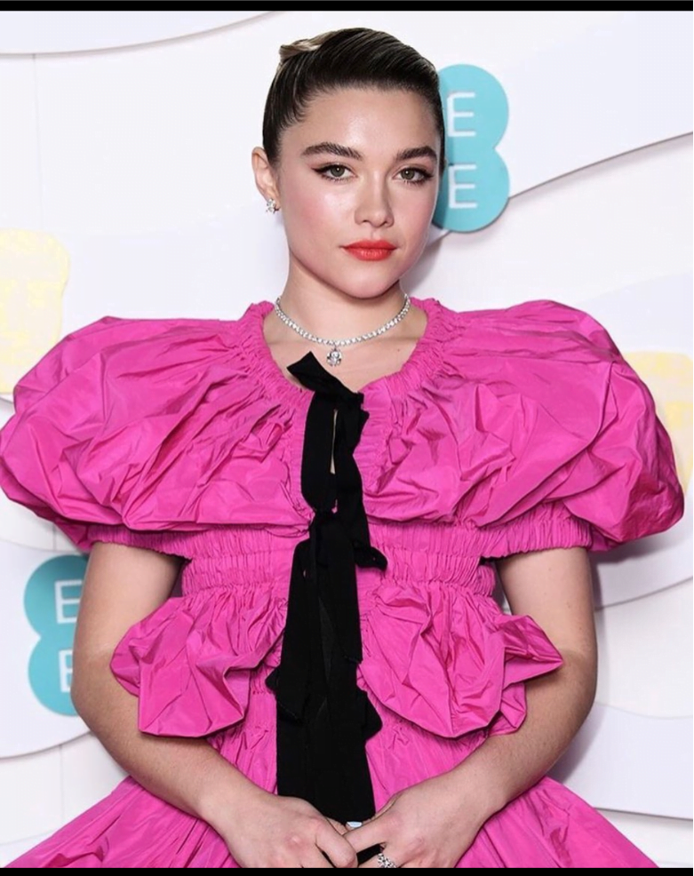 Florence Pugh wear a sheer pink Valentino gown during the brand’s show in Rome