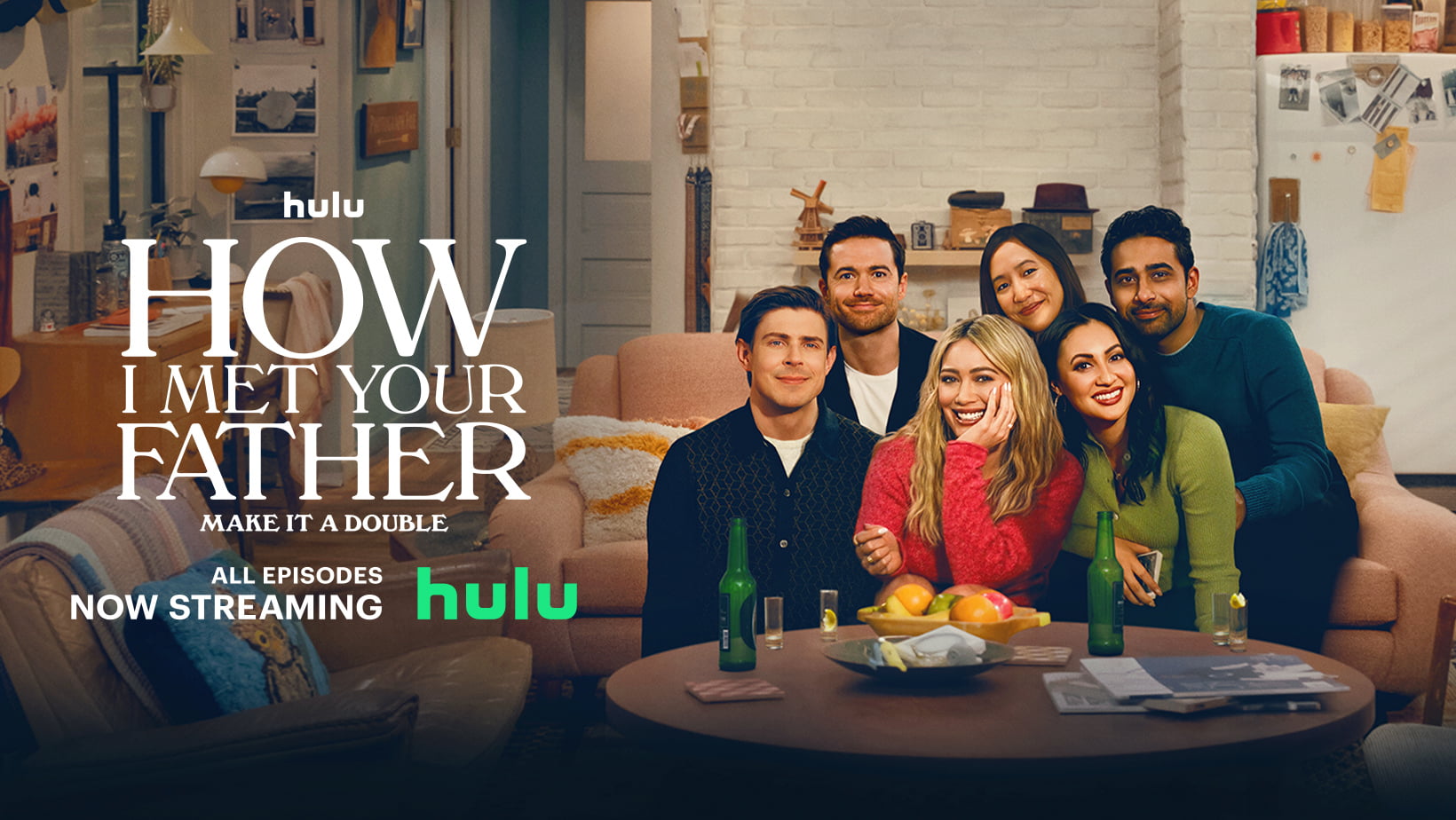 how i met your father Main Cast of Series - Hilary Duff as Sophie, Chris Lowell as Jesse, Ashley Reyes as Hannah, and Tom Ainsley as Charlie, sitting on a sofa, showcasing the chemistry and dynamic characters of the show.'"